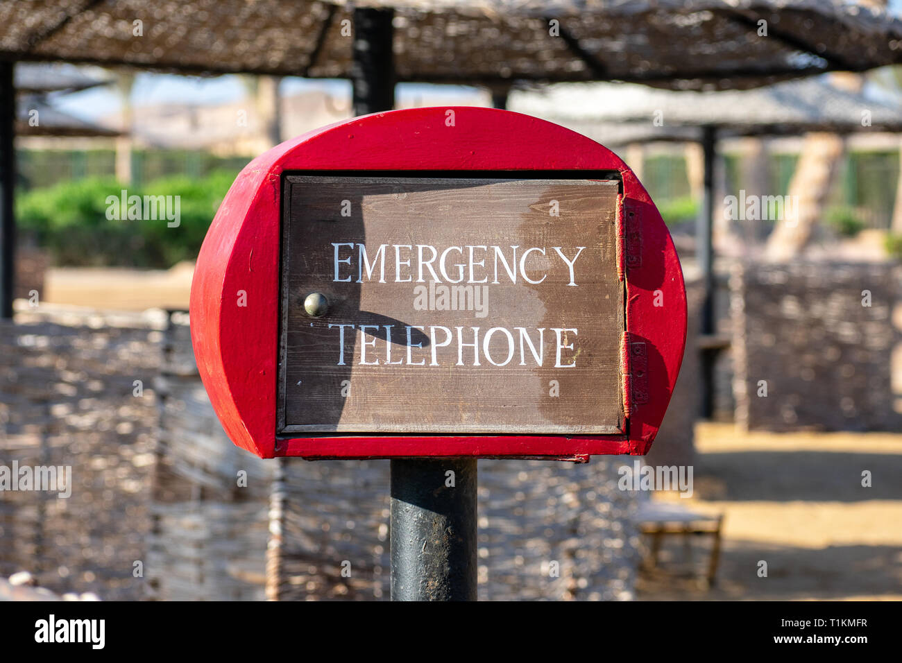 Emergency telephone box at the beach Stock Photo - Alamy