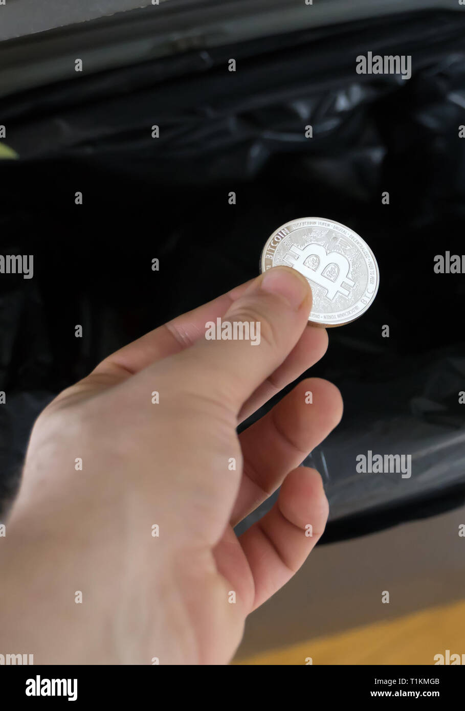 Man throwing rubbish in bin hires stock photography and images Alamy