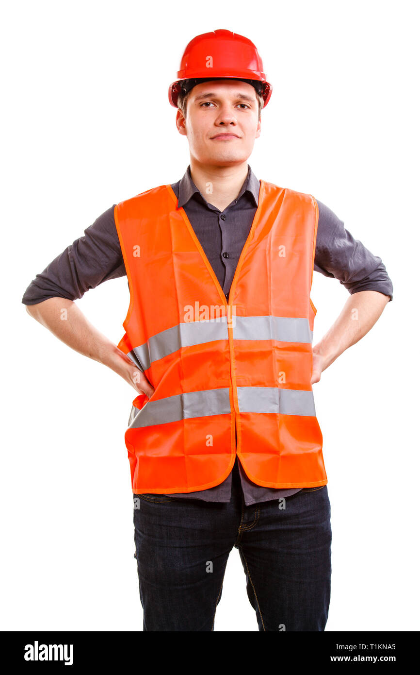 Young man construction worker builder foreman in orange safety vest and red  hard hat isolated on white. Safety in industrial work. Studio shot Stock  Photo - Alamy