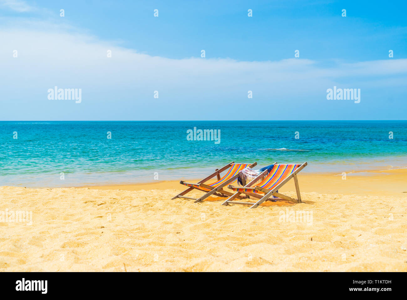 Two Deck chairs at the beach Stock Photo - Alamy