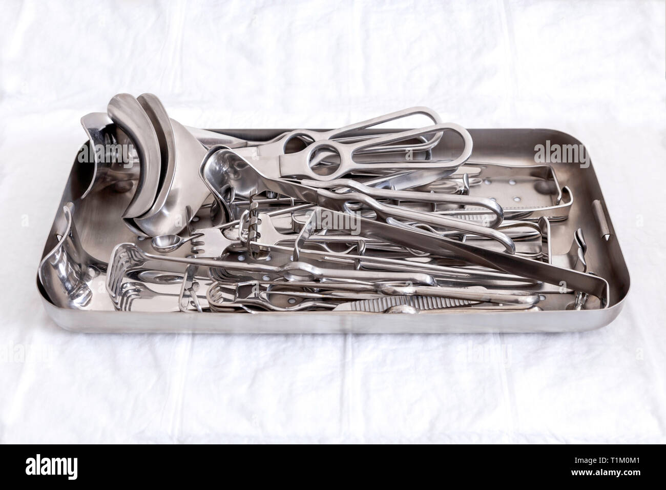 Gynecological sterile tools. A lot of instruments of gynecologist on ...