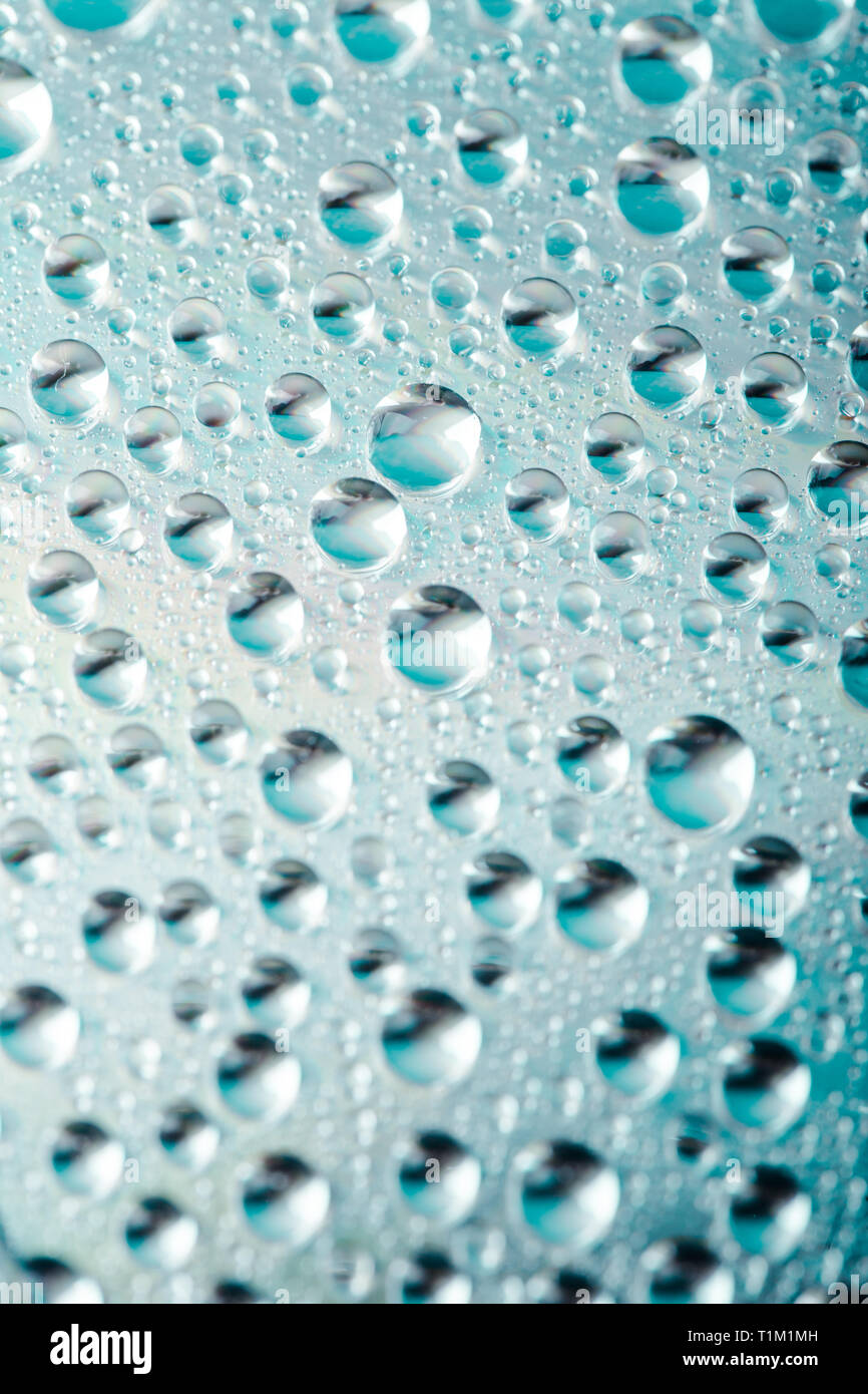 Water drops on blue background. Close up Stock Photo - Alamy