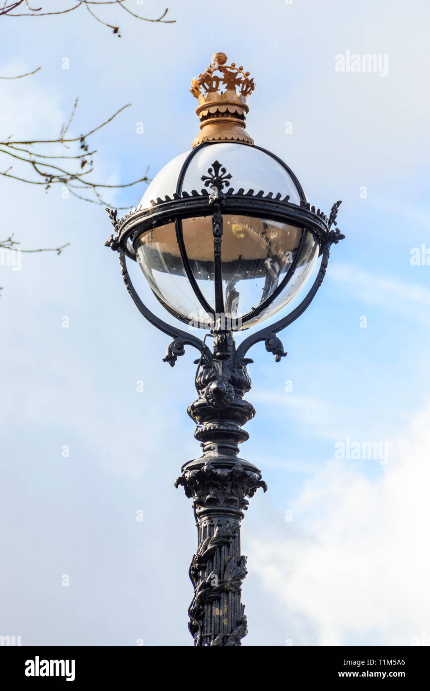 Detail of the decorative ironwork of a Victorian lamp post on Hornsey Lane Bridge, know as 'suicide bridge', over the A1 Archway Road in London, UK Stock Photo