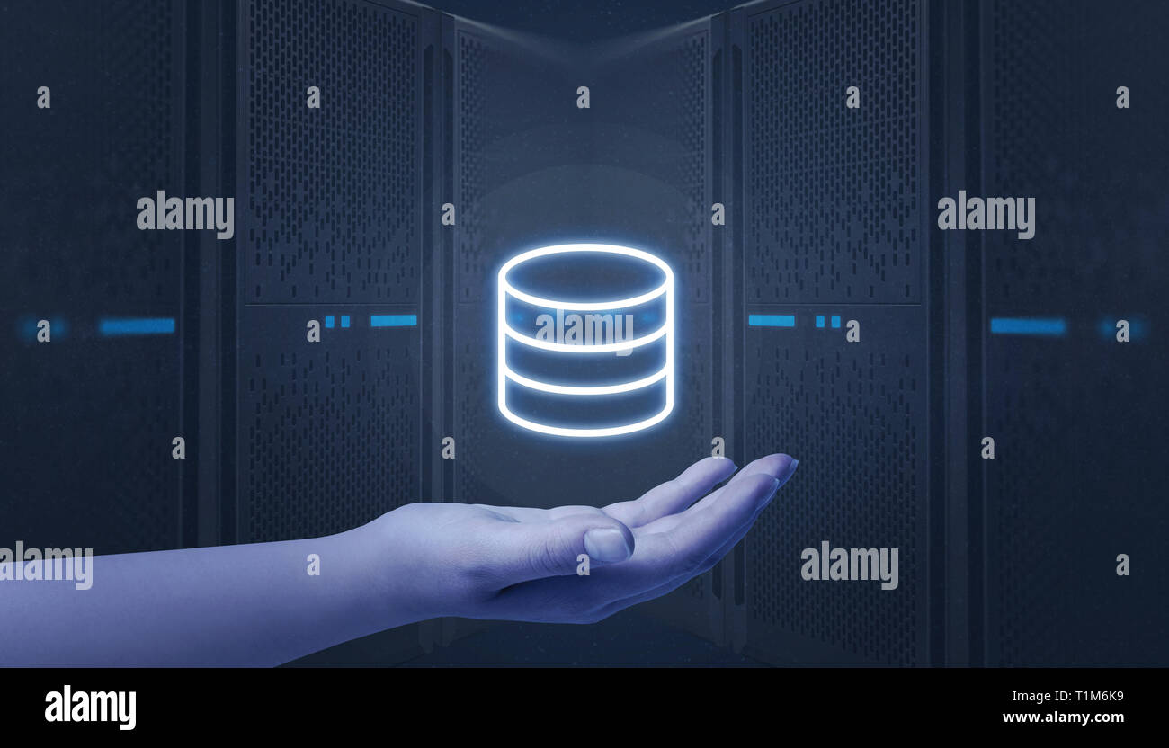 Hand holding server, data center icon. Web hosting servers in background. Stock Photo