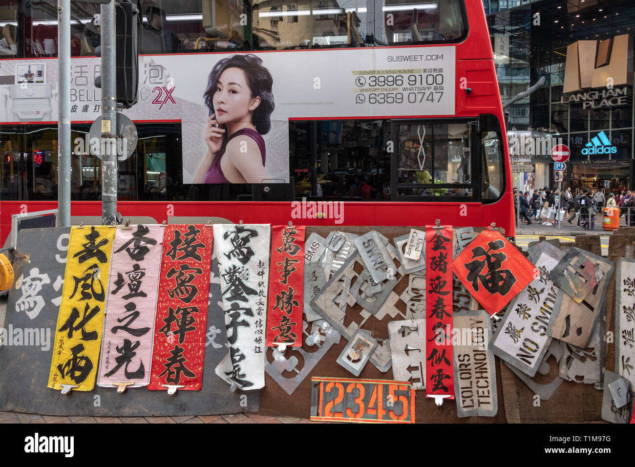 Chinese Sign Shop and Bus, Hong Kong Stock Photo