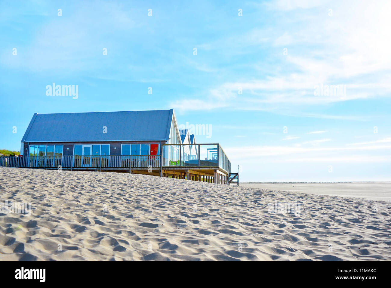 Beach pavillion 'Faro2' with restaurant at the north end of island Texel in the Netherlands Stock Photo