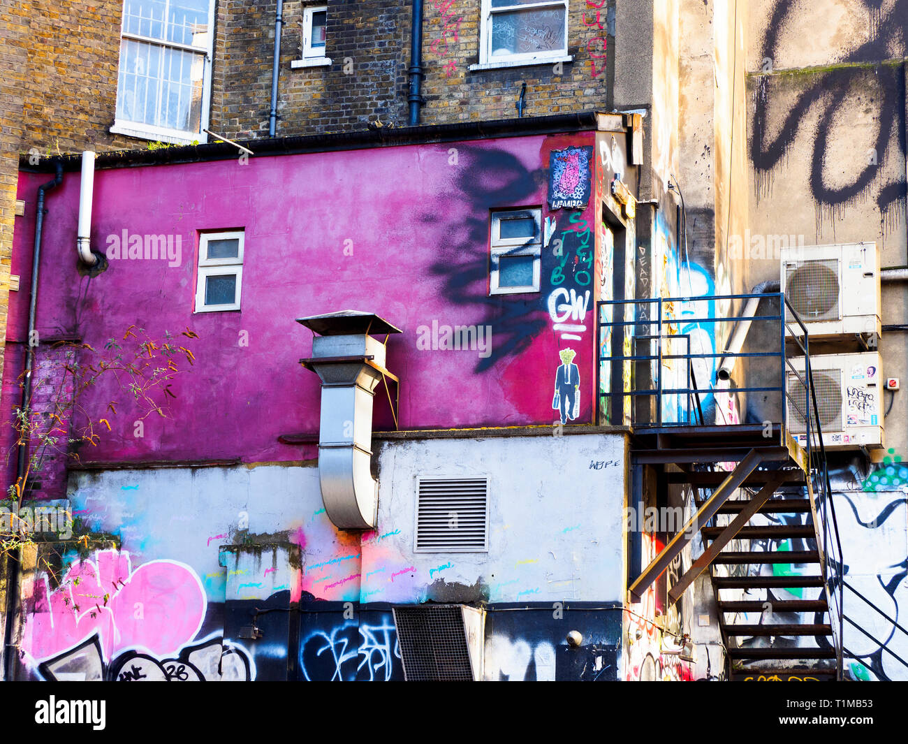 Street art at a building rear facade in Shoreditch - East London, England Stock Photo