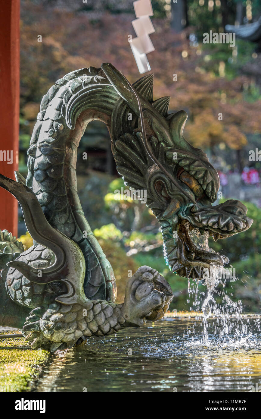 Dragon at Chozuya or Temizuya (Water ablution pavilion) of Kitaguchi Hongu Fuji Sengen Jinja shinto shrine. Located at Fujiyoshida city, Yamanashi Pre Stock Photo