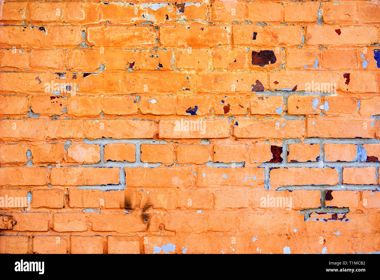 Weathered orange brick wall texture as background Stock Photo - Alamy