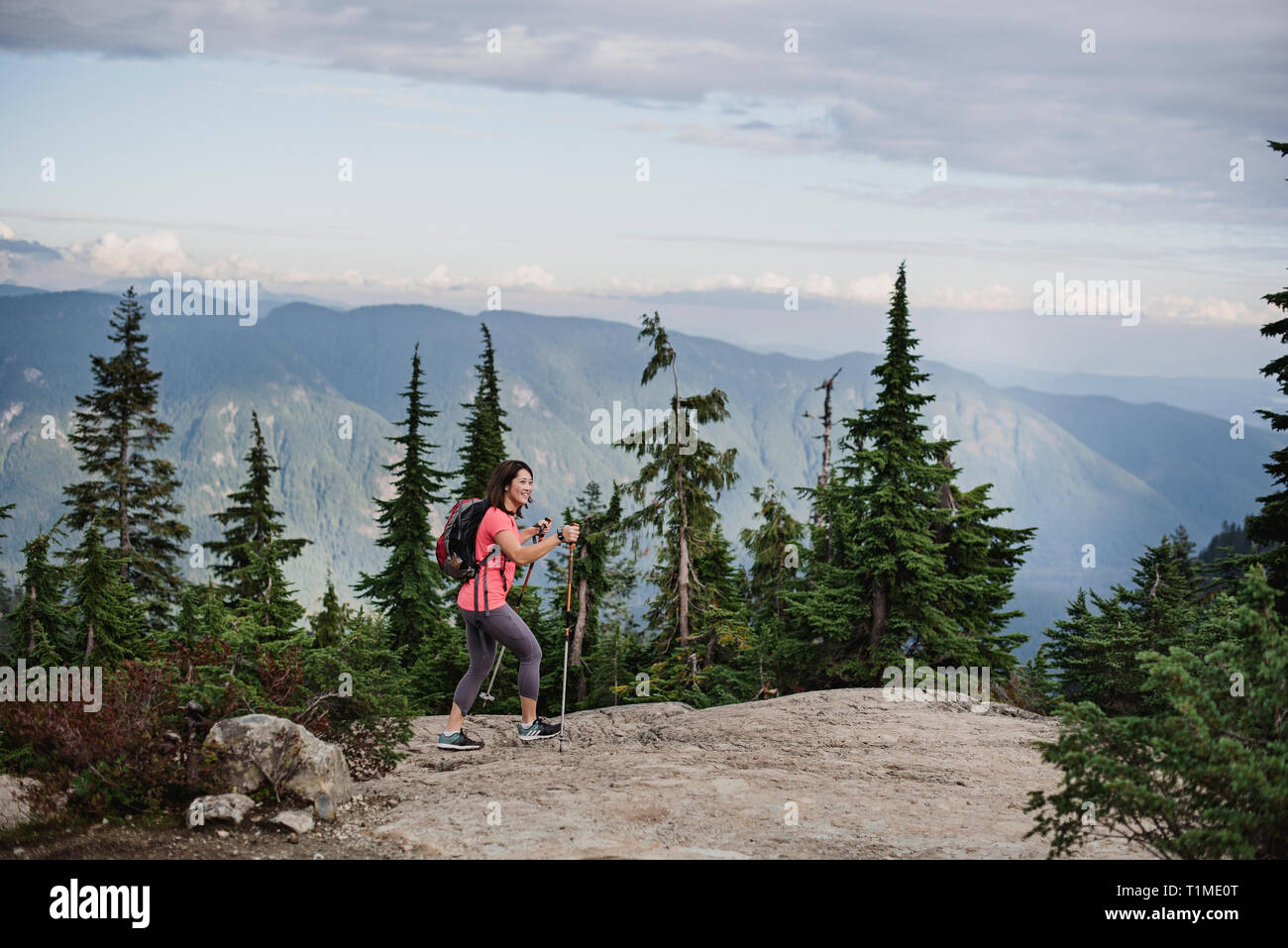 Full side view woman hiking hi-res stock photography and images - Alamy