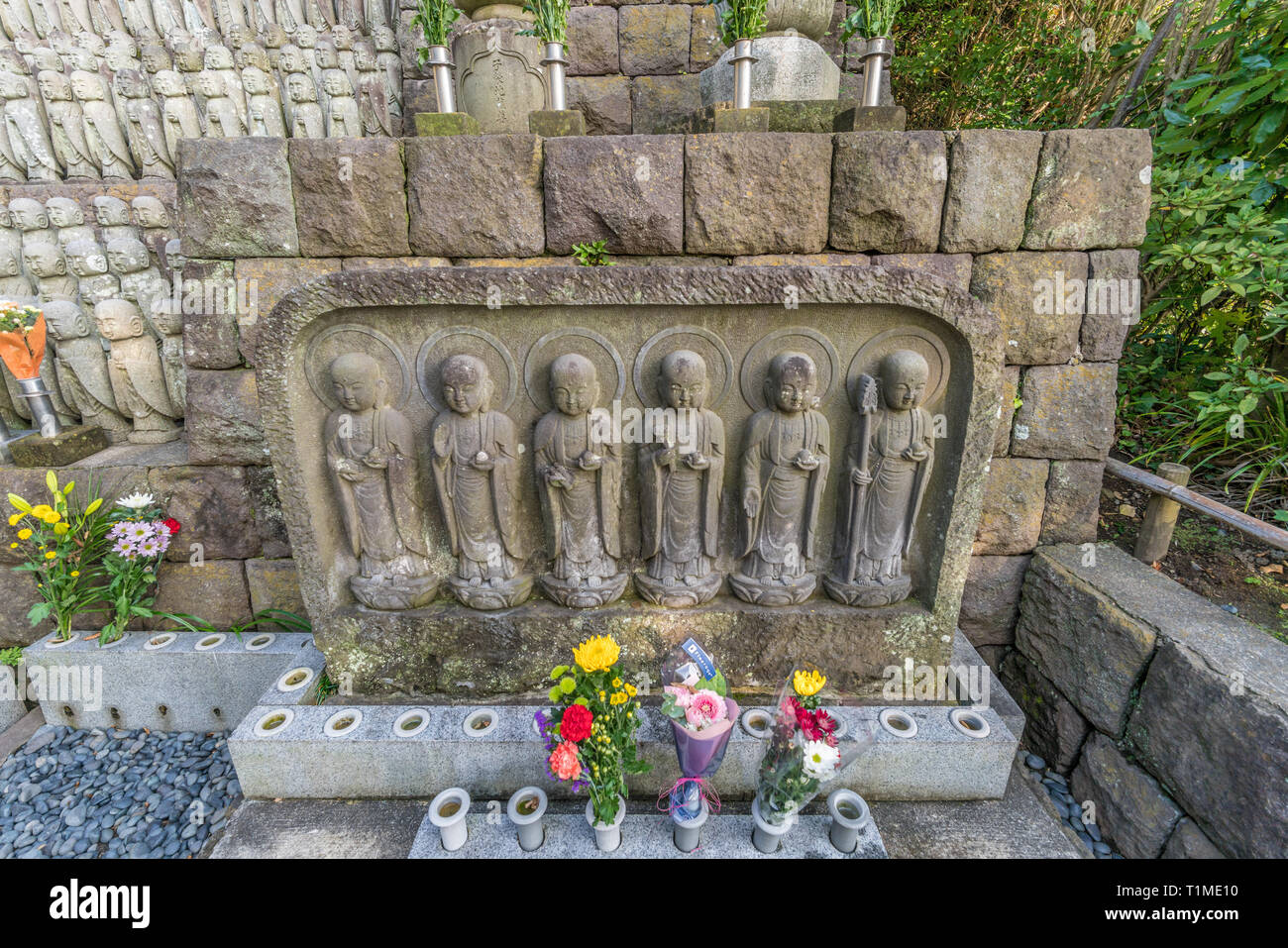 Rows of old Jizo Bodhisattva (Bosatsu) statues grouped near Jizodo
