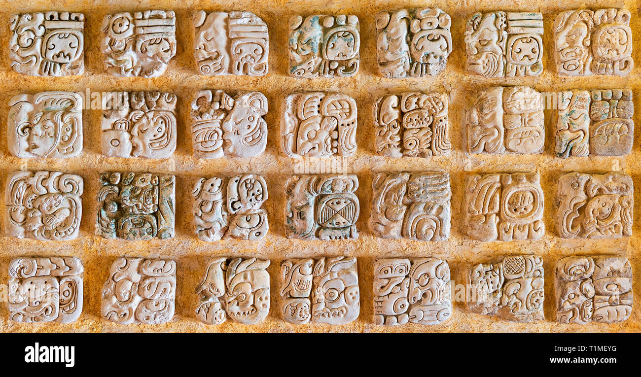 Panorama of hieroglyph symbols of the Maya Alphabet. These symbolize words and can be found in archaeological sites in Mexico, Guatemala and Honduras. Stock Photo
