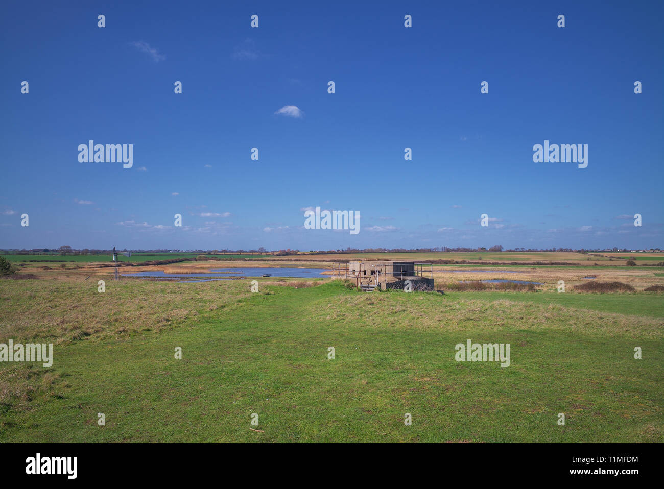 Infantry Pillbox circa 1940 overlooking Holland Marshes Essex. Stock Photo