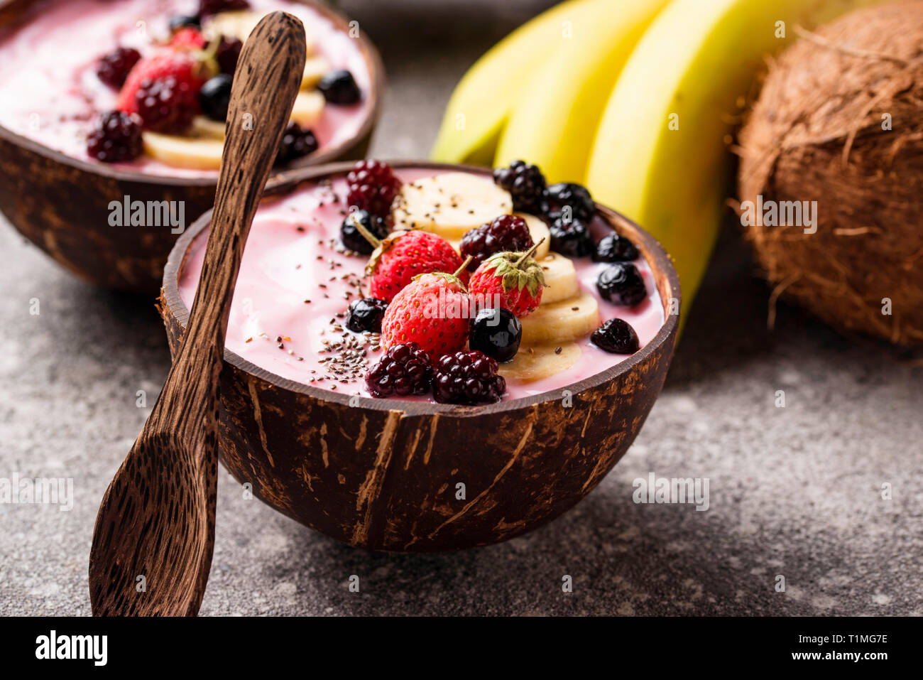 Acai bowl in coconut plate Stock Photo Alamy