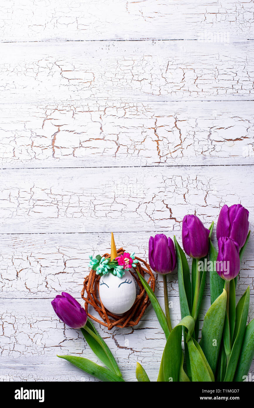 Easter background with tulip and unicorn eggs Stock Photo - Alamy
