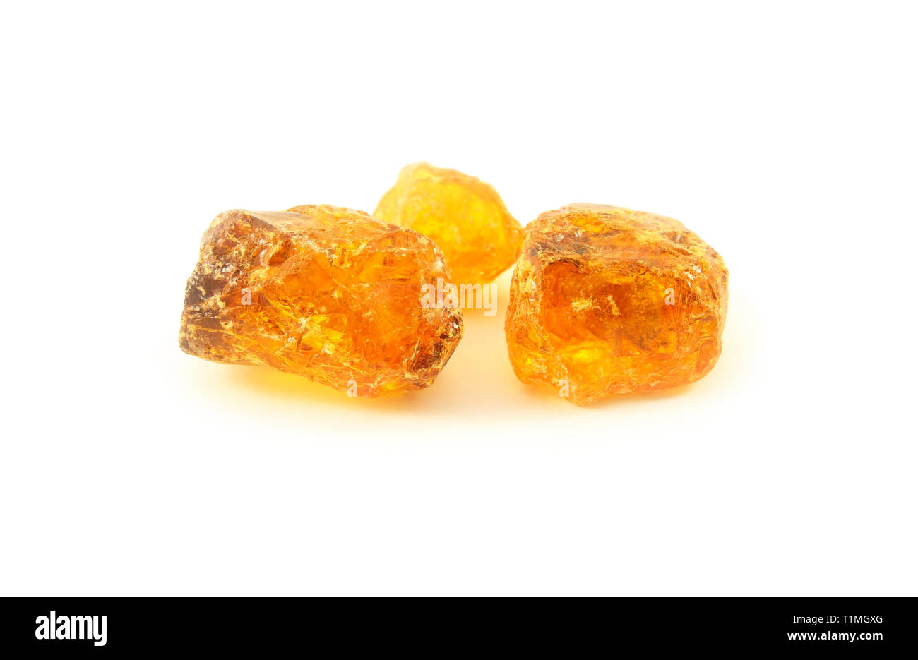 Pieces of rosin closeup isolated on white Stock Photo