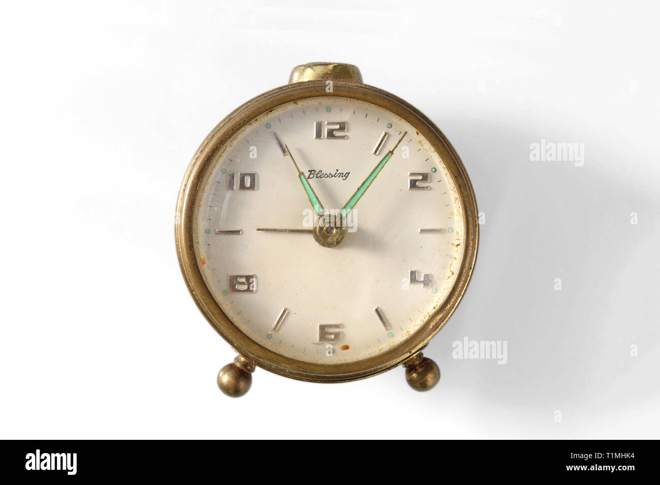 Vintage alarm clock, Blessing made in Germany, isolated on white  background, close-up Stock Photo - Alamy