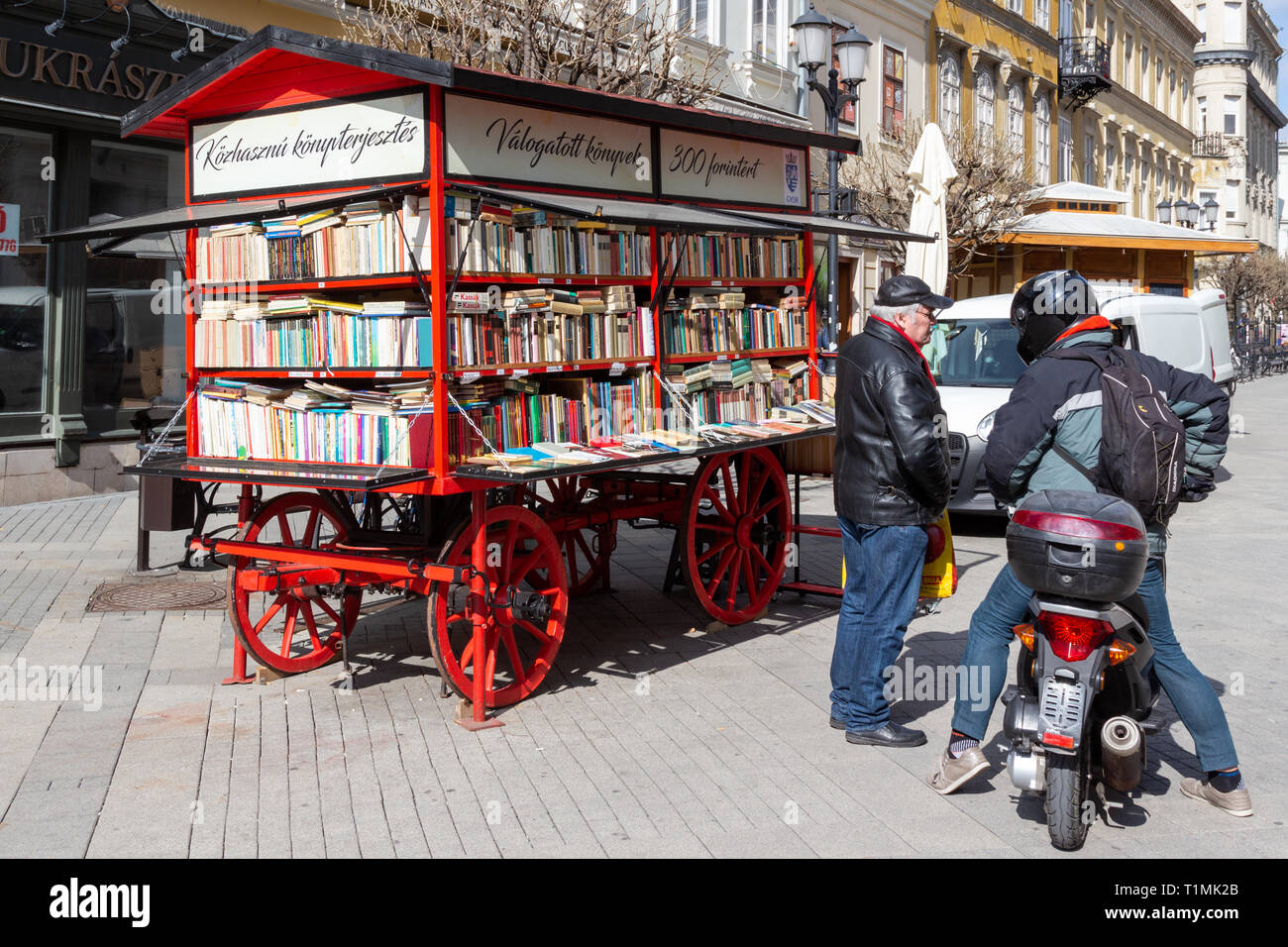 Book savers cart in Gyor, Hungary. Public book distribution for low