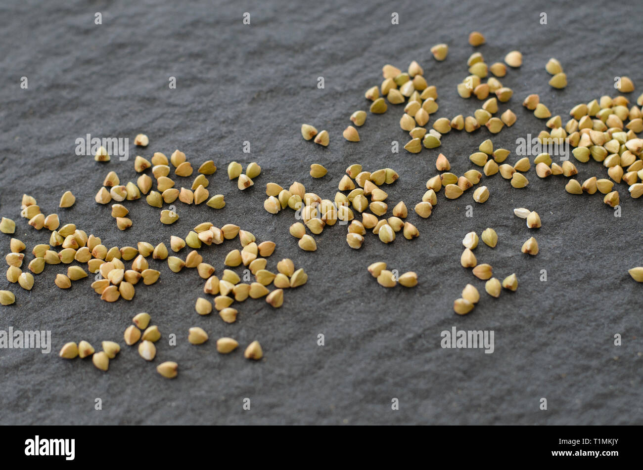 Raw buckwheat groats Stock Photo Alamy