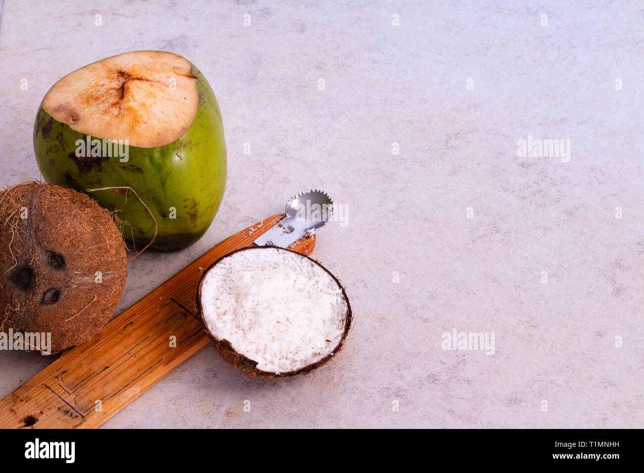 Coconuts with textured background Stock Photo - Alamy