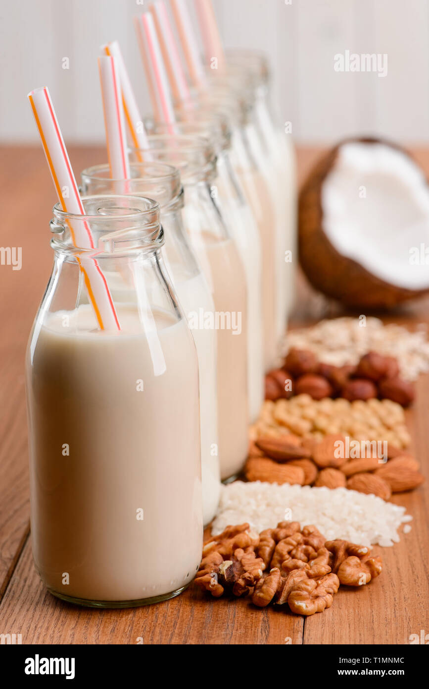 Bottles of dairyfree milk Stock Photo Alamy