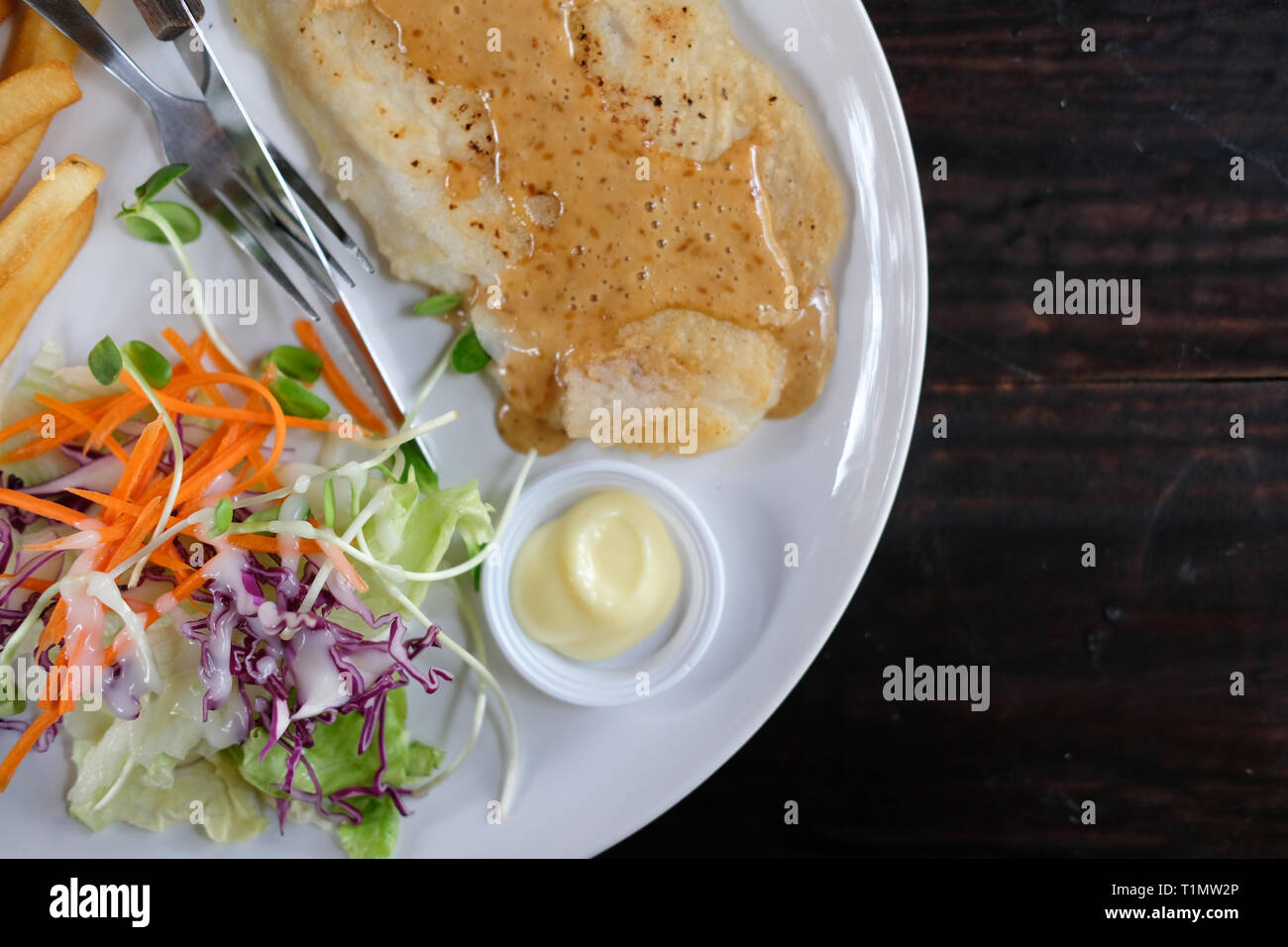 vegetable salad french fries grilled fish mayonnaise Stock Photo Alamy