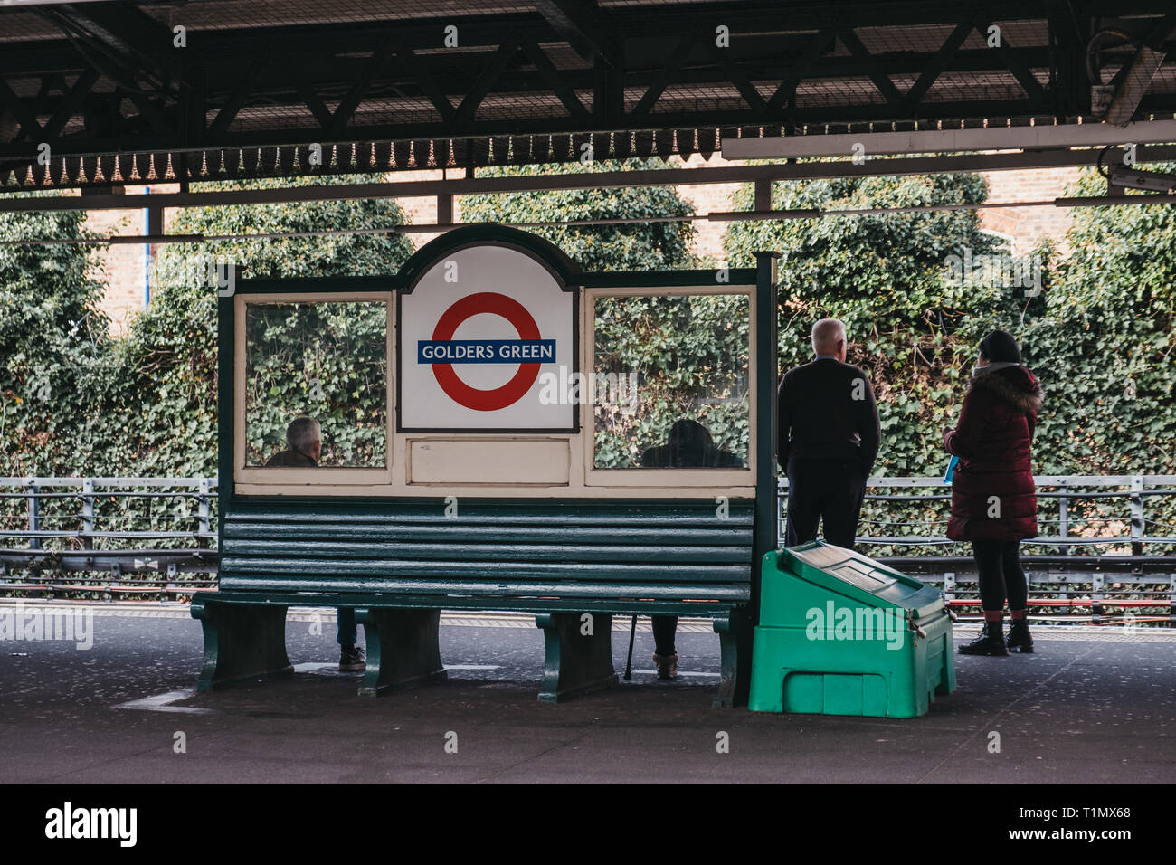 London, UK March 23, 2019 People waiting for the train on the