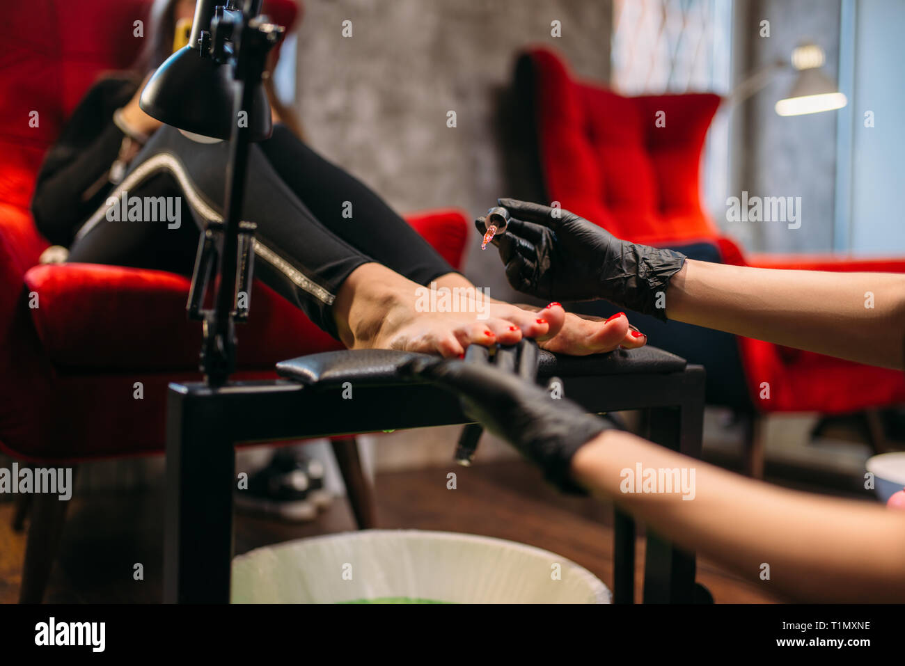 Pedicurist, cosmetic procedure with pedicure bath Stock Photo Alamy