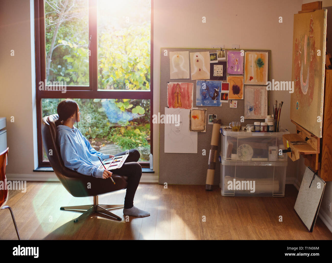 Female artist painting in art studio Stock Photo - Alamy