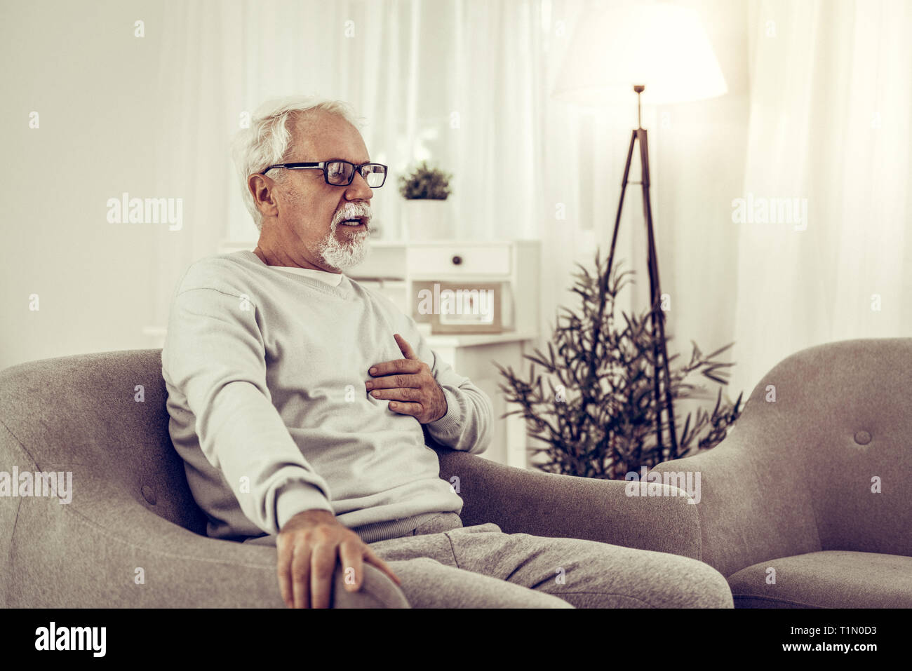 Grey haired old man shocked hi-res stock photography and images - Alamy