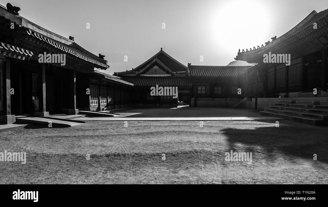 Sunbeams lighting the hanok, traditional korean house. Gyeongbokgung Palace, Seoul, South Korea. Stock Photo