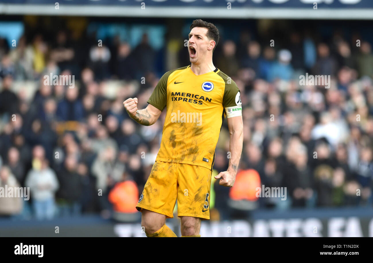 Lewis Dunk of Brighton celebrates the win during the FA Cup quarter final match between Millwall and Brighton & Hove Albion at The Den London . 17 March 2019 Editorial use only. No merchandising. For Football images FA and Premier League restrictions apply inc. no internet/mobile usage without FAPL license - for details contact Football Dataco Stock Photo