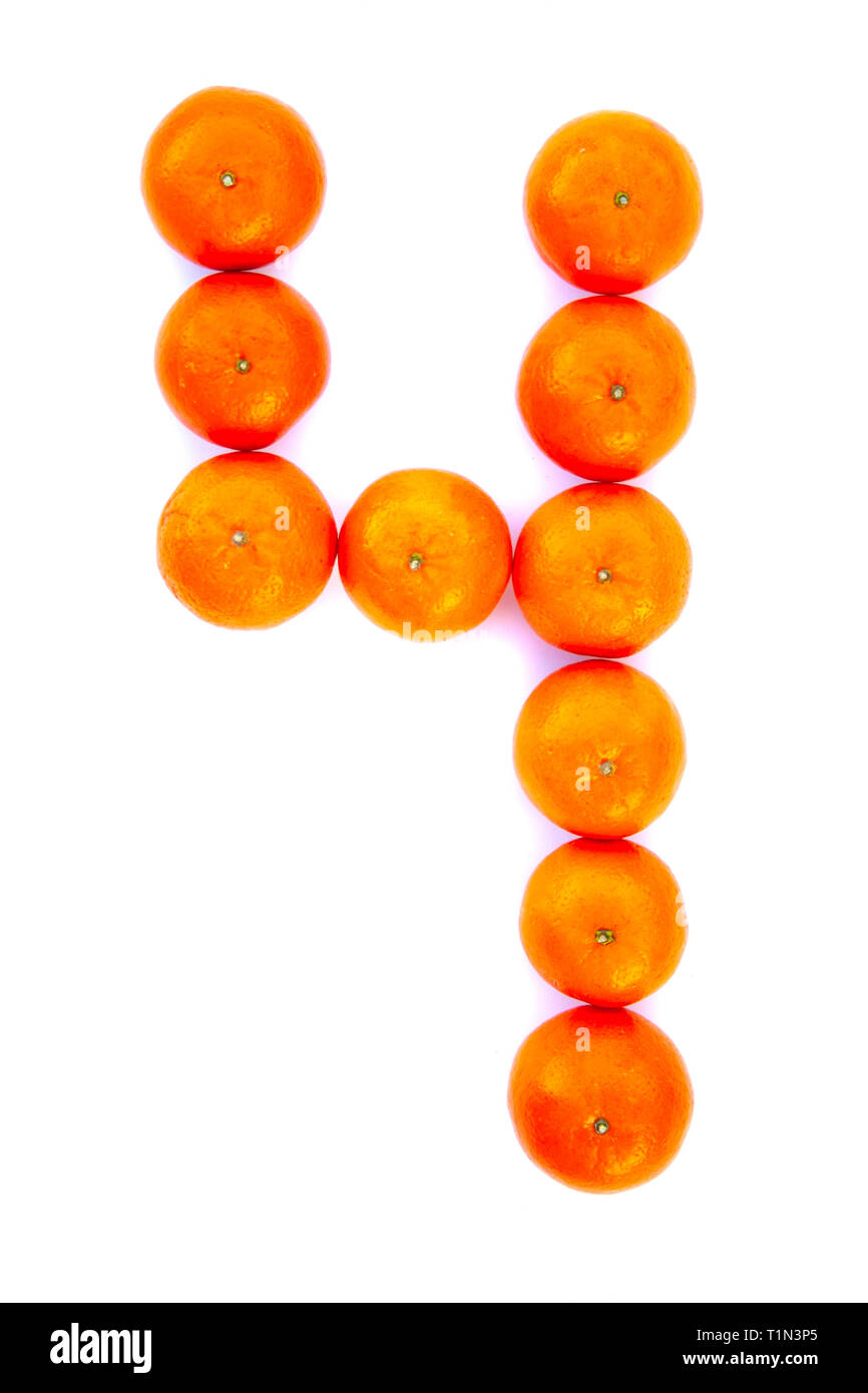Number solved with tangerines isolated on white background. Mandarine