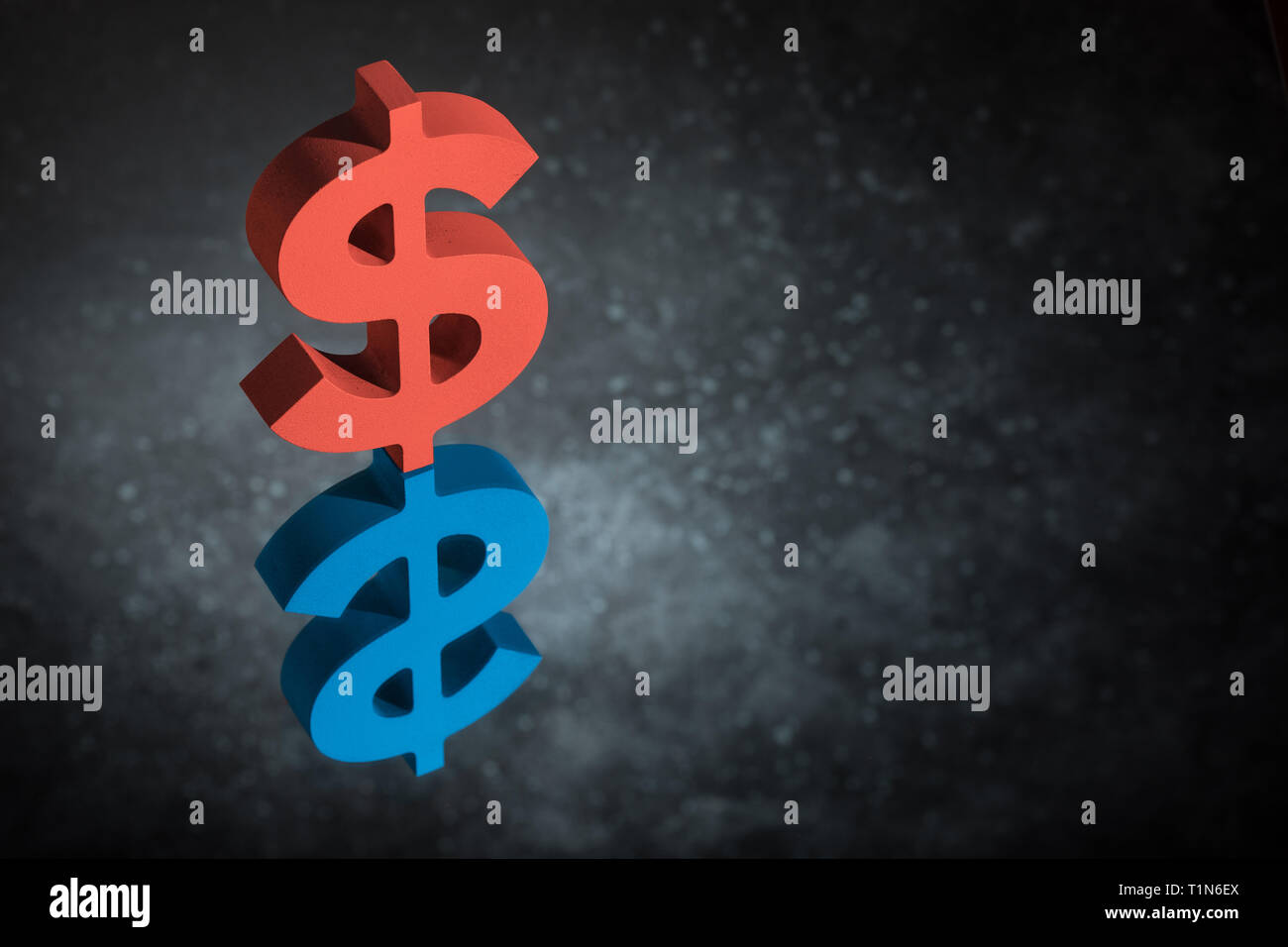 Red and Blue American Currency Symbol or Sign Dollar With Mirror Reflection on Dark Dusty Background Stock Photo