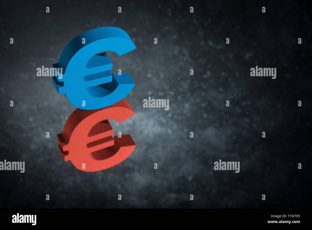 Red and Blue European Currency Symbol or Sign Euro With Mirror Reflection on Dark Dusty Background Stock Photo