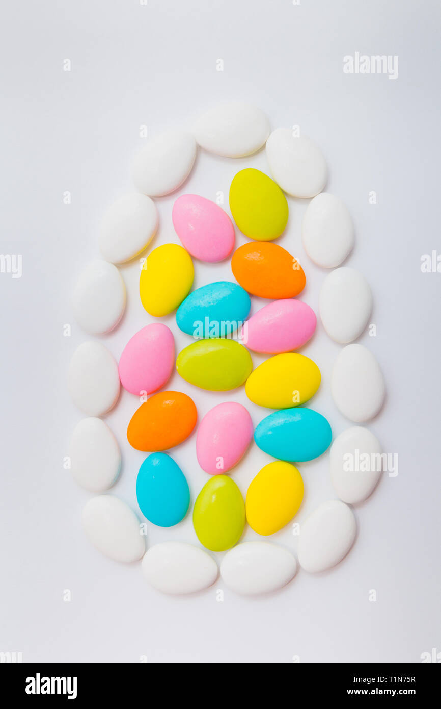 Easter egg shape made of chocolate eggs. Holiday concept. Stock Photo