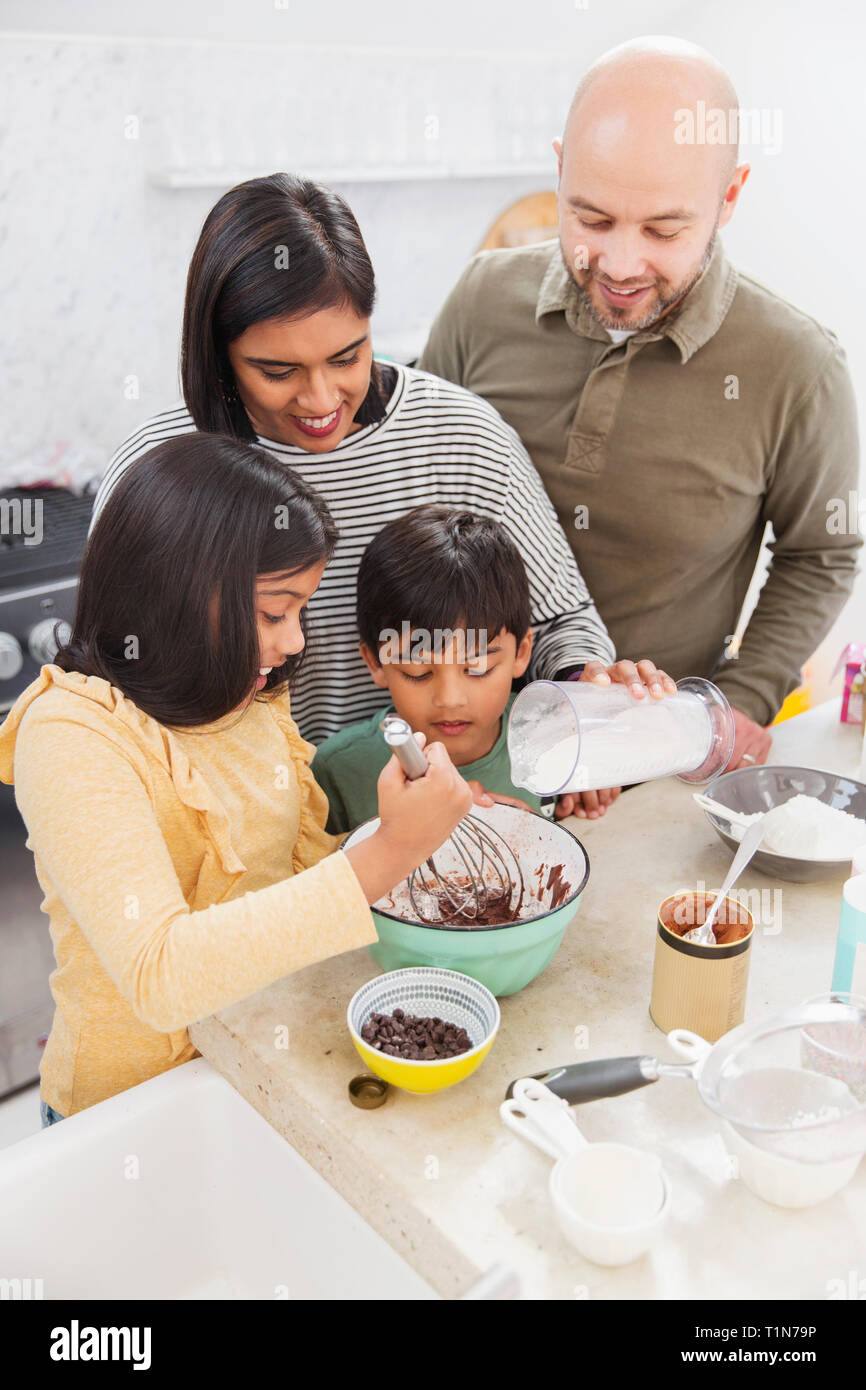 Family baking in kitchen Stock Photo Alamy
