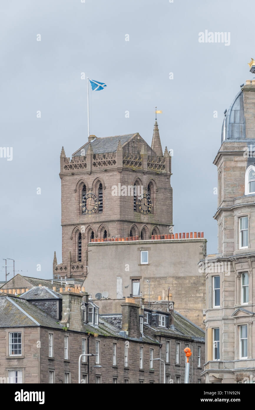 Dundee, Scotland, UK - March 22, 2019: Looking up over Dundee's roof tops and St Mary's Tower standing proud. Stock Photo