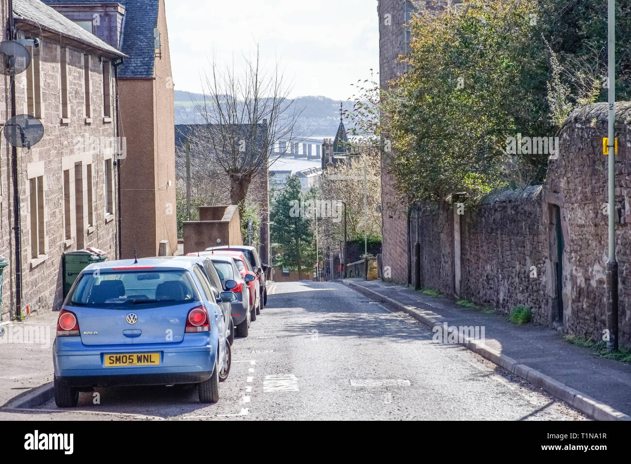 Dundee, Scotland, UK - March 23, 2019:Looking Down Forebank Road  where you can see the Fourth Road Bridge in the distance through Dundees ancient str Stock Photo