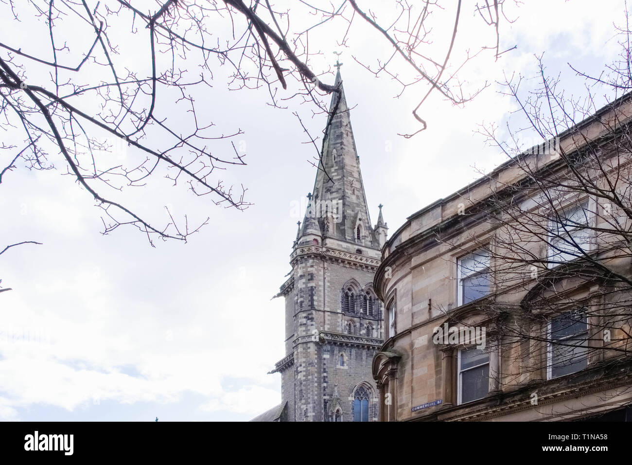 Dundee, Scotland, UK - March 23, 2019: St Paul's Cathedral Tower and rooftops in the city centre of Dundee in Scotland. Stock Photo