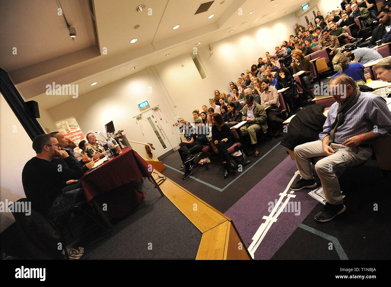 London, England. 16th March, 2019. Members of the audience listening to the panel speakers, during the closing plenary, 'A media manifesto for the nex Stock Photo