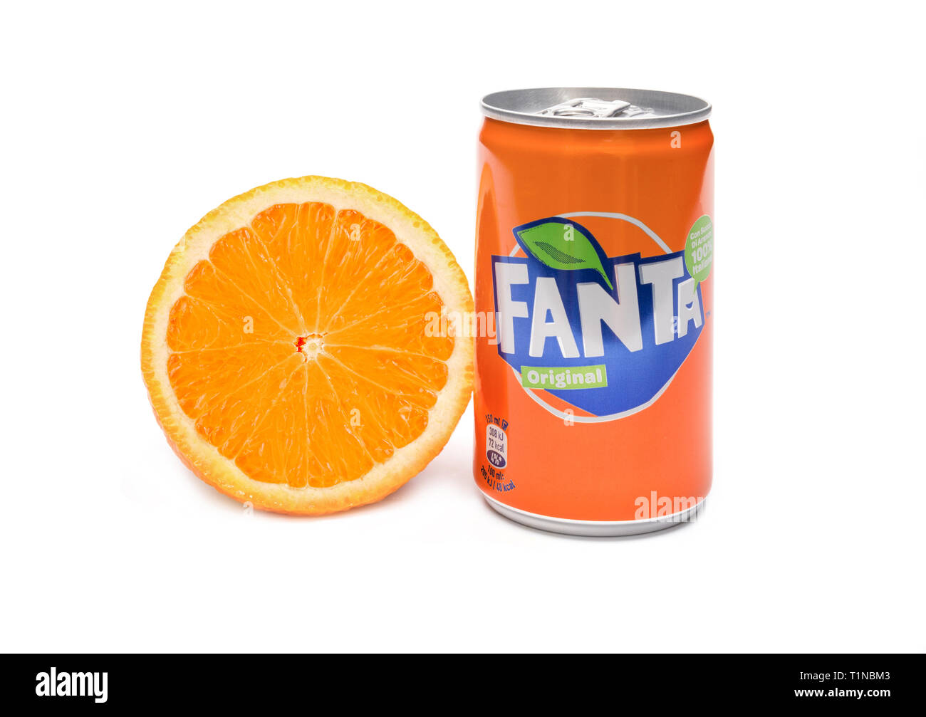 Naples,Italy - 21 march 2018: can of Fanta orange soft drink on white background and  fresh raw oranges. Stock Photo