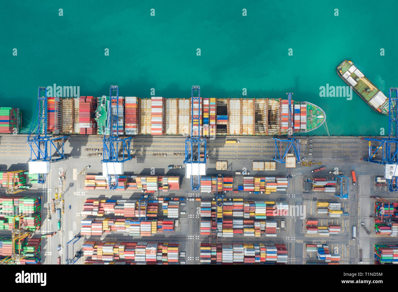 Aerial top view container cargo ship working. Business import export logistic and transportation of International by ship in the open sea. Stock Photo