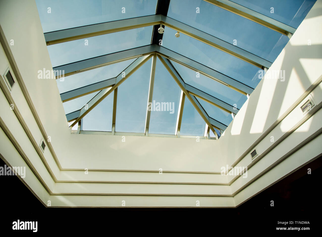 Geometric glass roof . Modern interior design Stock Photo - Alamy