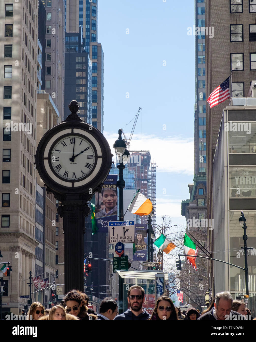 Sidewalk clock made by  Seth Thomas at 522 Fifth Avenue & West 44th Street, Manhattan, New York City. March 2018 Stock Photo