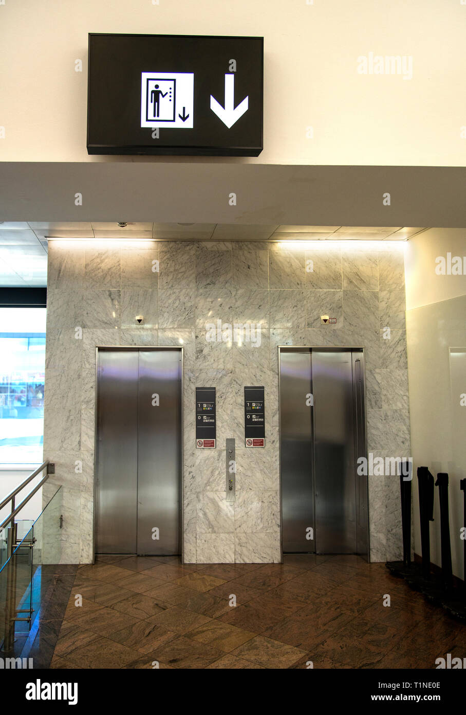 Elevators or lift in the airport with sign Stock Photo