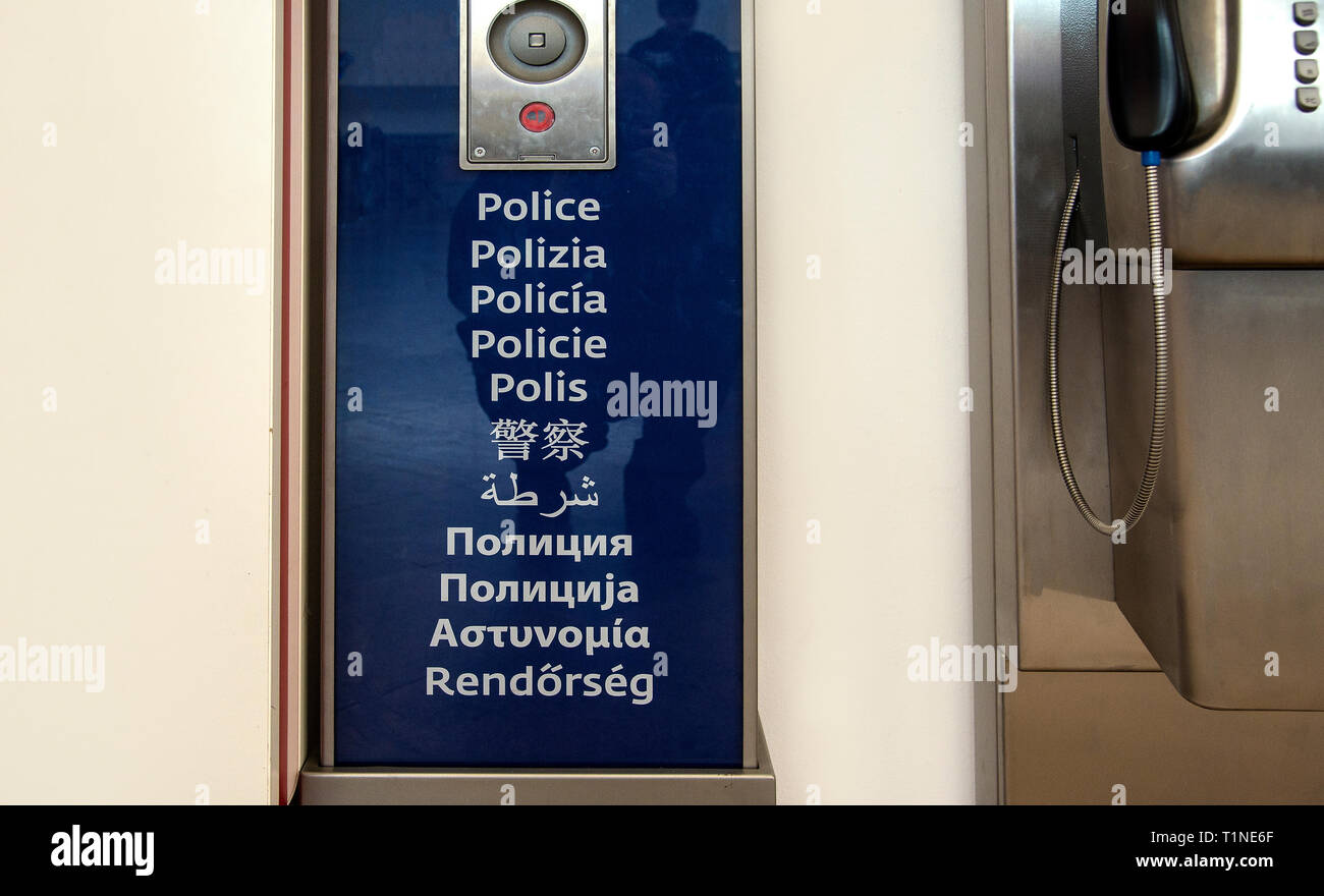 Multigual police phone in the public building. Help concept Stock Photo