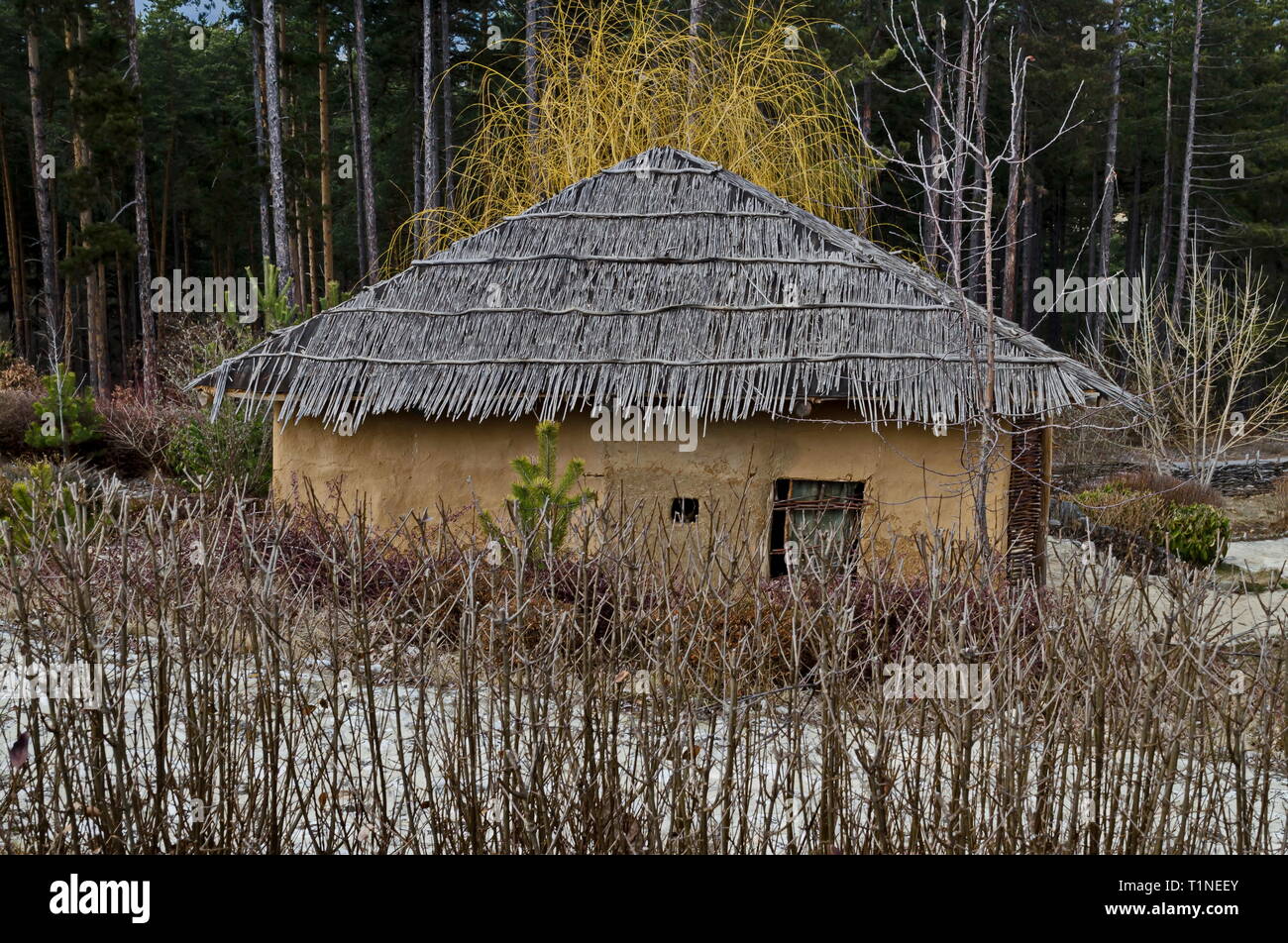 Archaeological park Topolnitsa with neolithic houses reconstruction for relax and traditional celebrate near village Chavdar, Sofia, Bulgaria, Europe Stock Photo