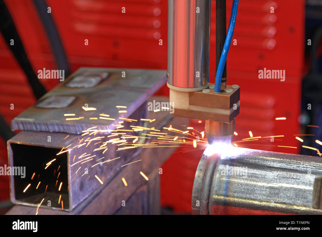 Robot Welding Pipe Automated Production in Factory Stock Photo