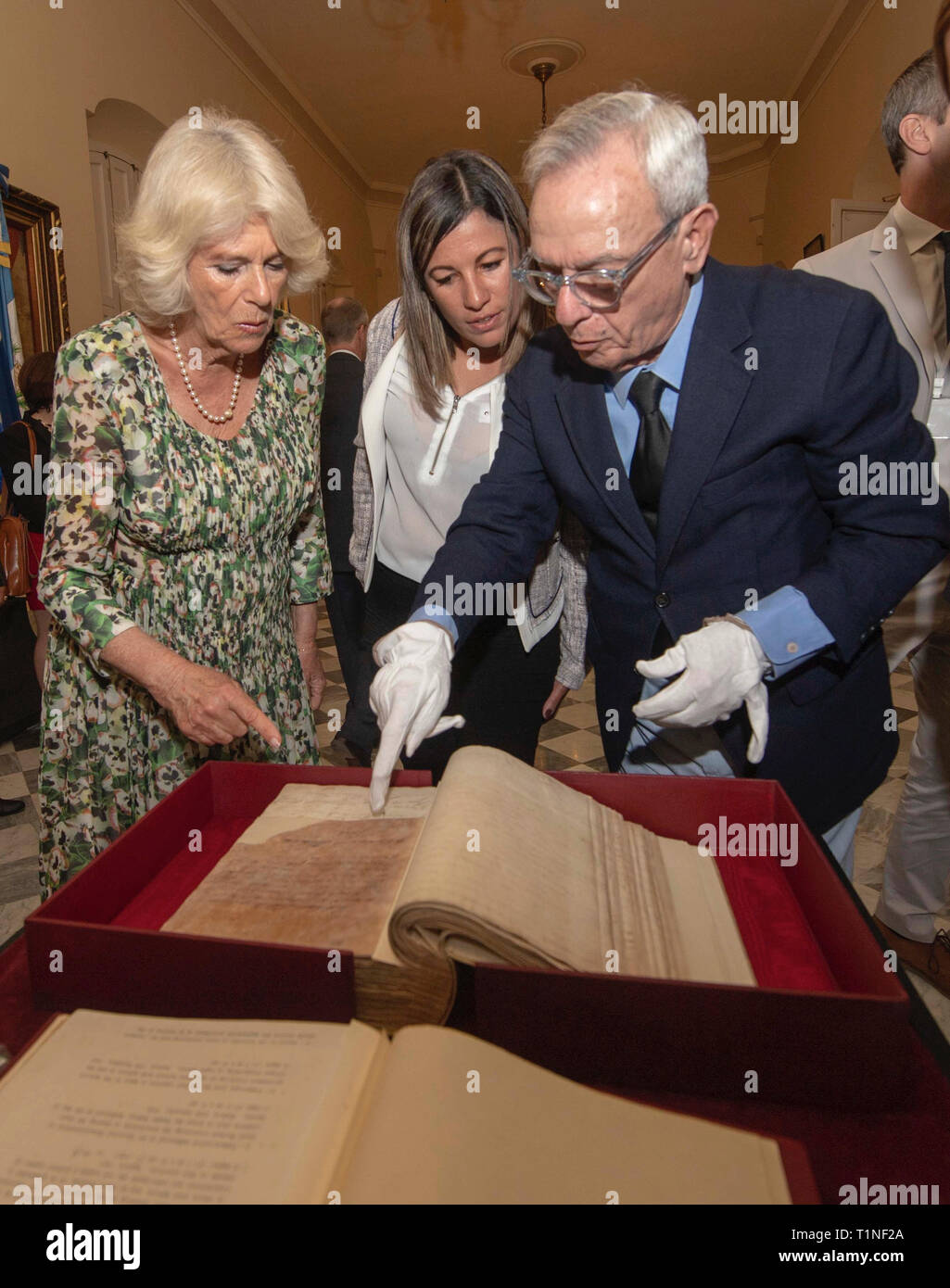 The Duchess of Cornwall looks at the signature of her relative, George Keppel the 3rd Earl of Albemarle in a book as she attends a reception at the Palacio de los Capitanes Generales in Havana, Cuba. Stock Photo